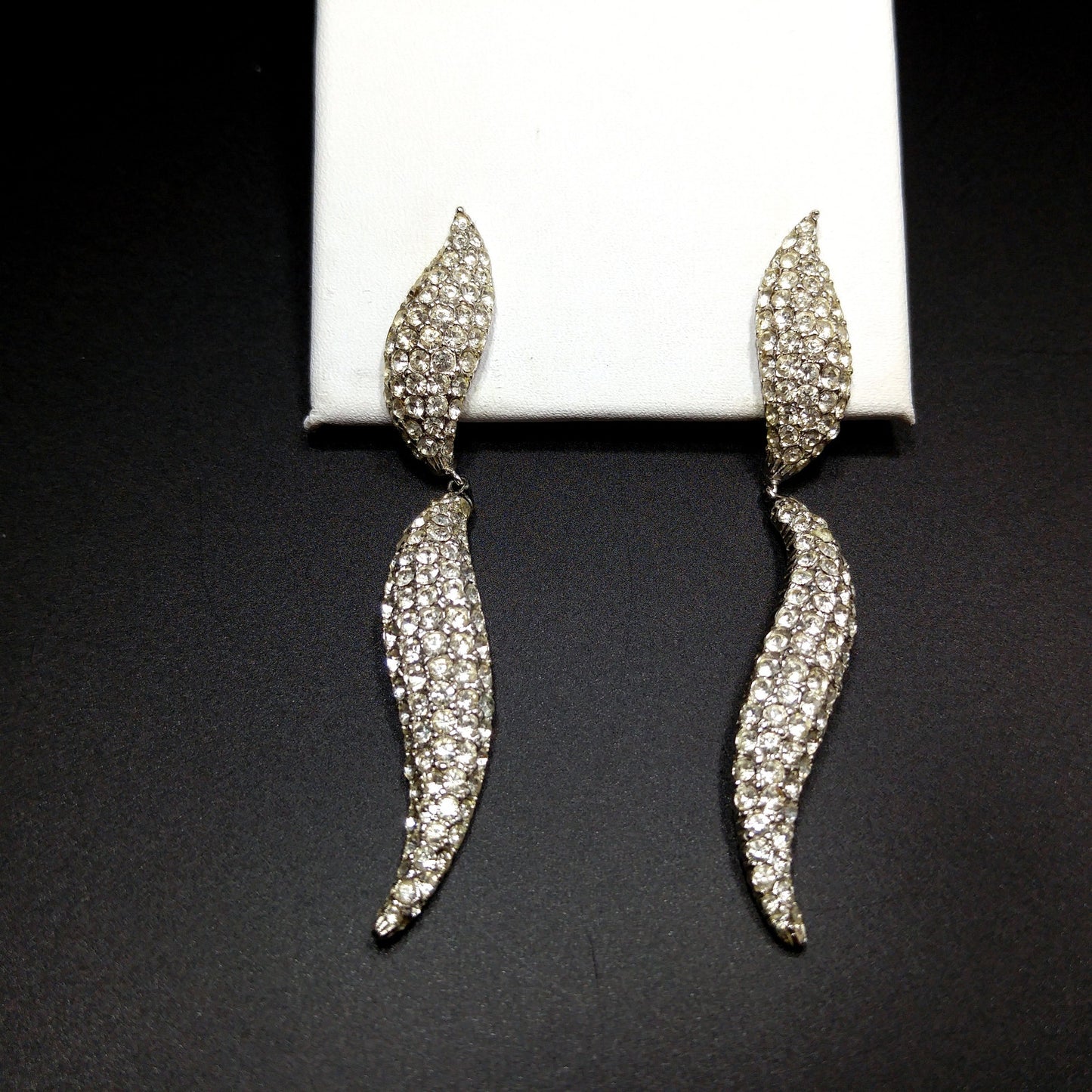 Ciner 1990s Rhodium Plated Pavé Rhinestone Curved Dangle Earrings – Vintage Designer Jewelry