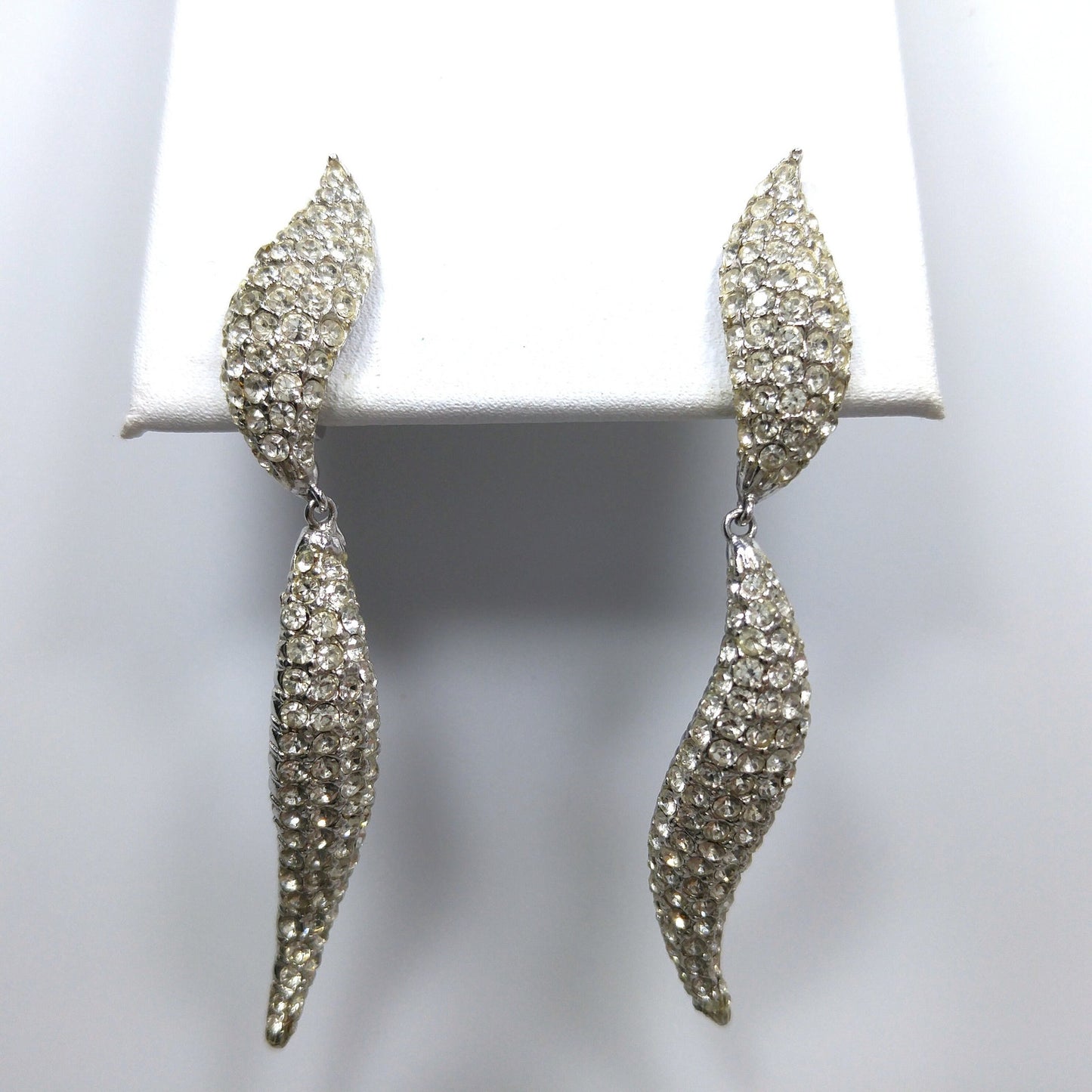 Ciner 1990s Rhodium Plated Pavé Rhinestone Curved Dangle Earrings – Vintage Designer Jewelry