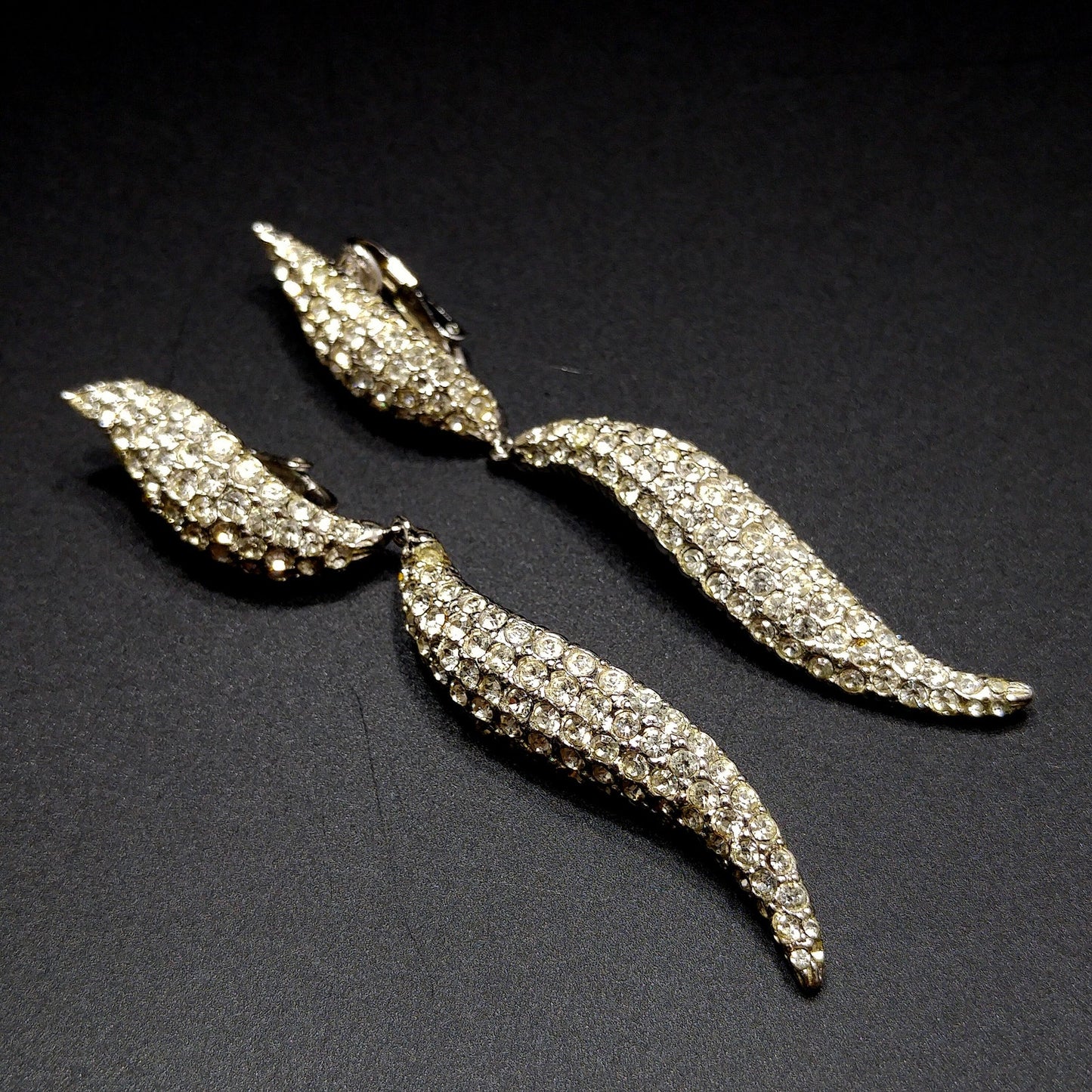Ciner 1990s Rhodium Plated Pavé Rhinestone Curved Dangle Earrings – Vintage Designer Jewelry