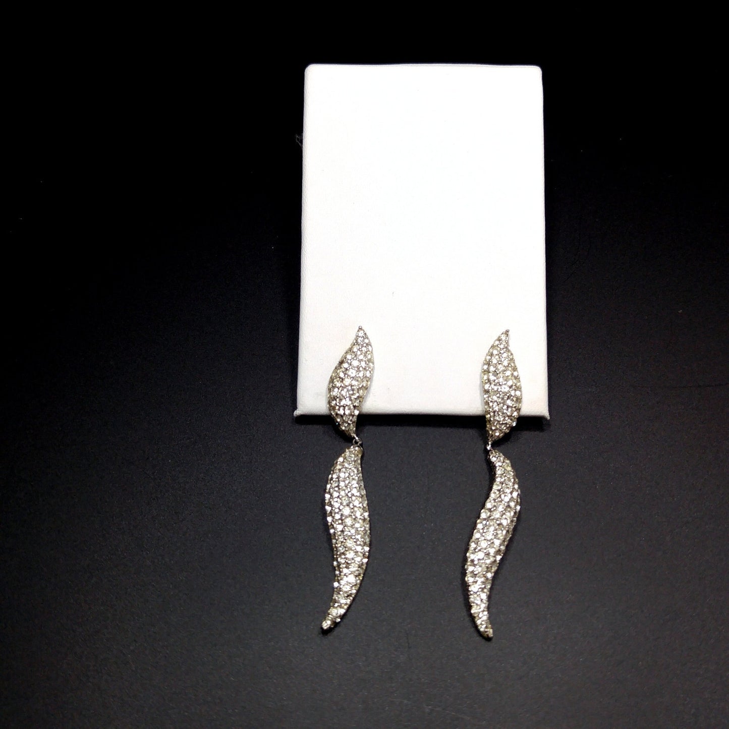 Ciner 1990s Rhodium Plated Pavé Rhinestone Curved Dangle Earrings – Vintage Designer Jewelry