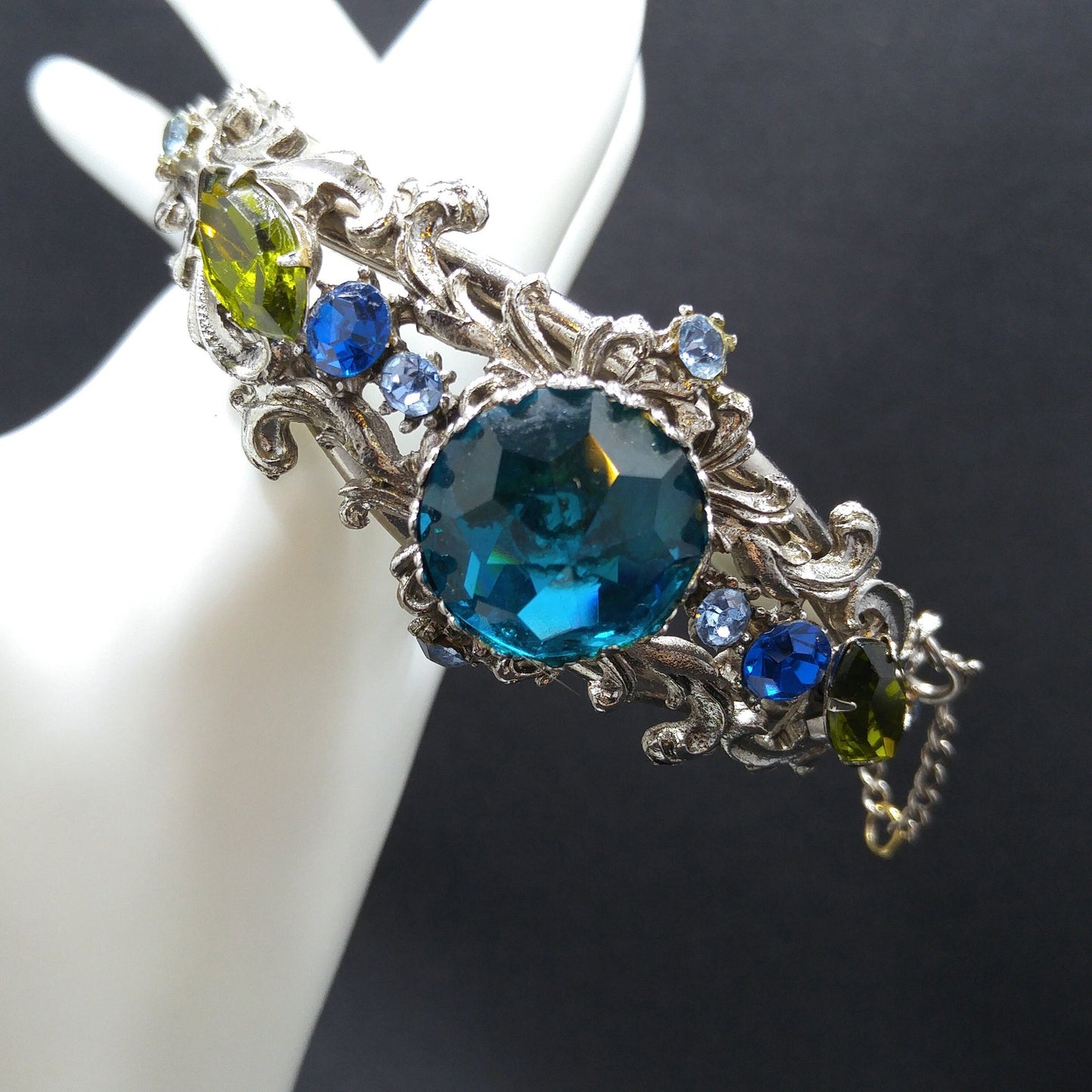 Teal Rivoli Rhinestone Hinged Bracelet, Safety Chain, Rhodium Plated, 1960s Vintage Jewelry