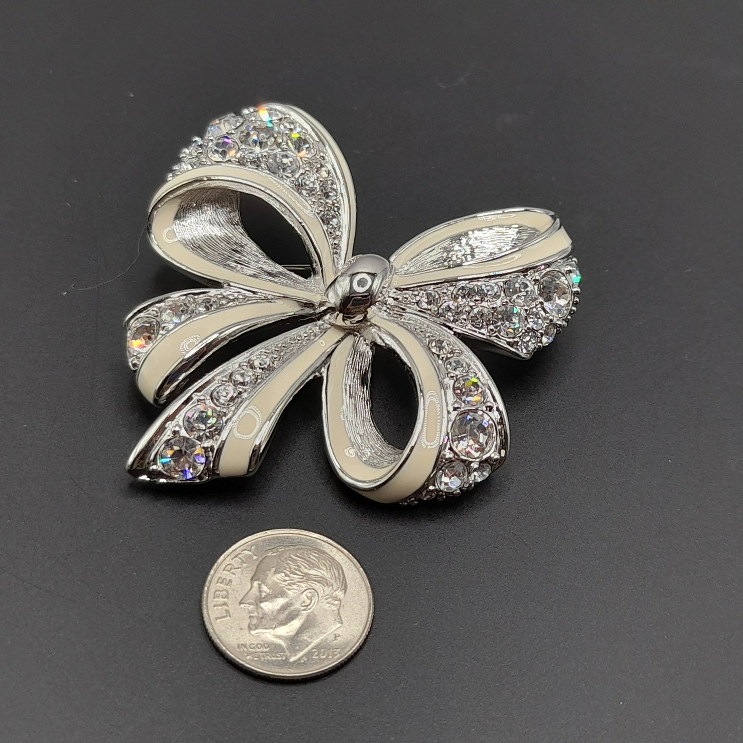 Vintage Nolan Miller Bow Brooch Rhodium Plated Clear Rhinestone White Enamel 2" Pin