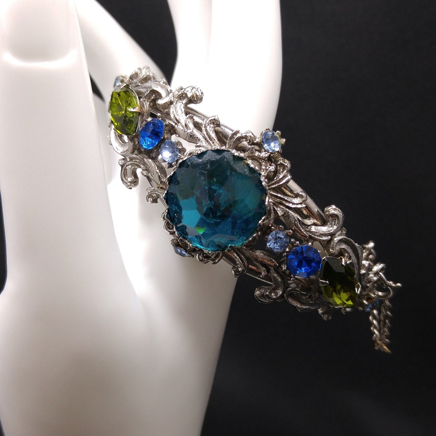 Teal Rivoli Rhinestone Hinged Bracelet, Safety Chain, Rhodium Plated, 1960s Vintage Jewelry
