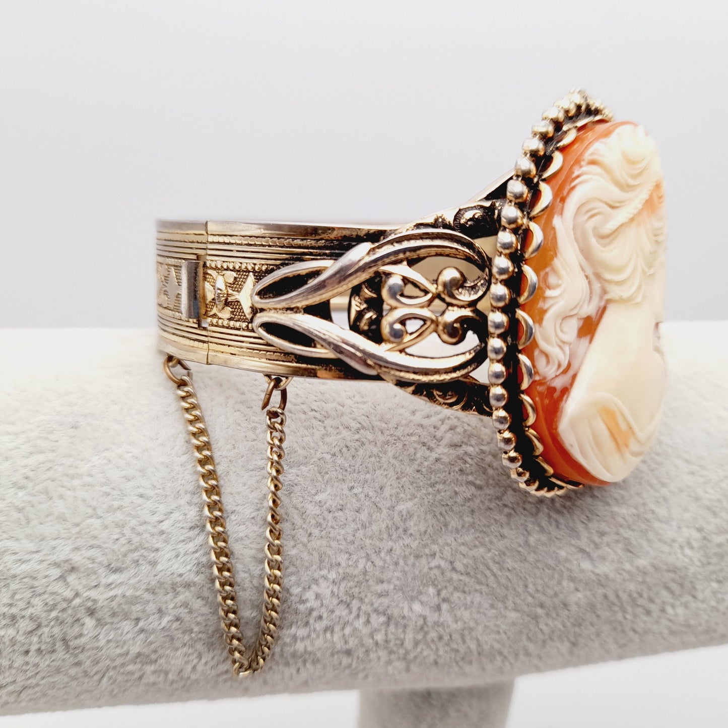 Vintage Lucite Cameo Gold Tone Hinged Bracelet with Safety Chain