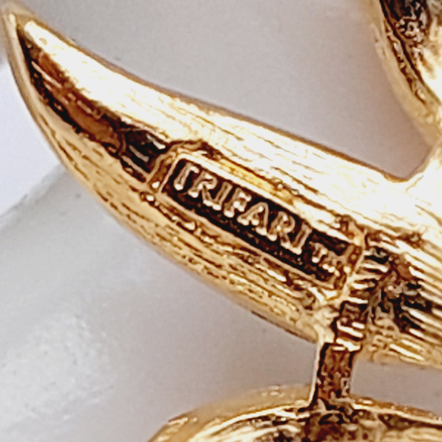 Vintage Trifari™ Flower Brooch with Pink Rhinestone Center