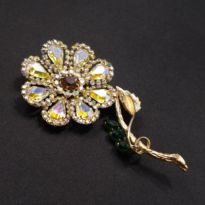 Weiss 1960s Aurora Borealis Rhinestone Flower Brooch with Green Leaves – Gold Plated