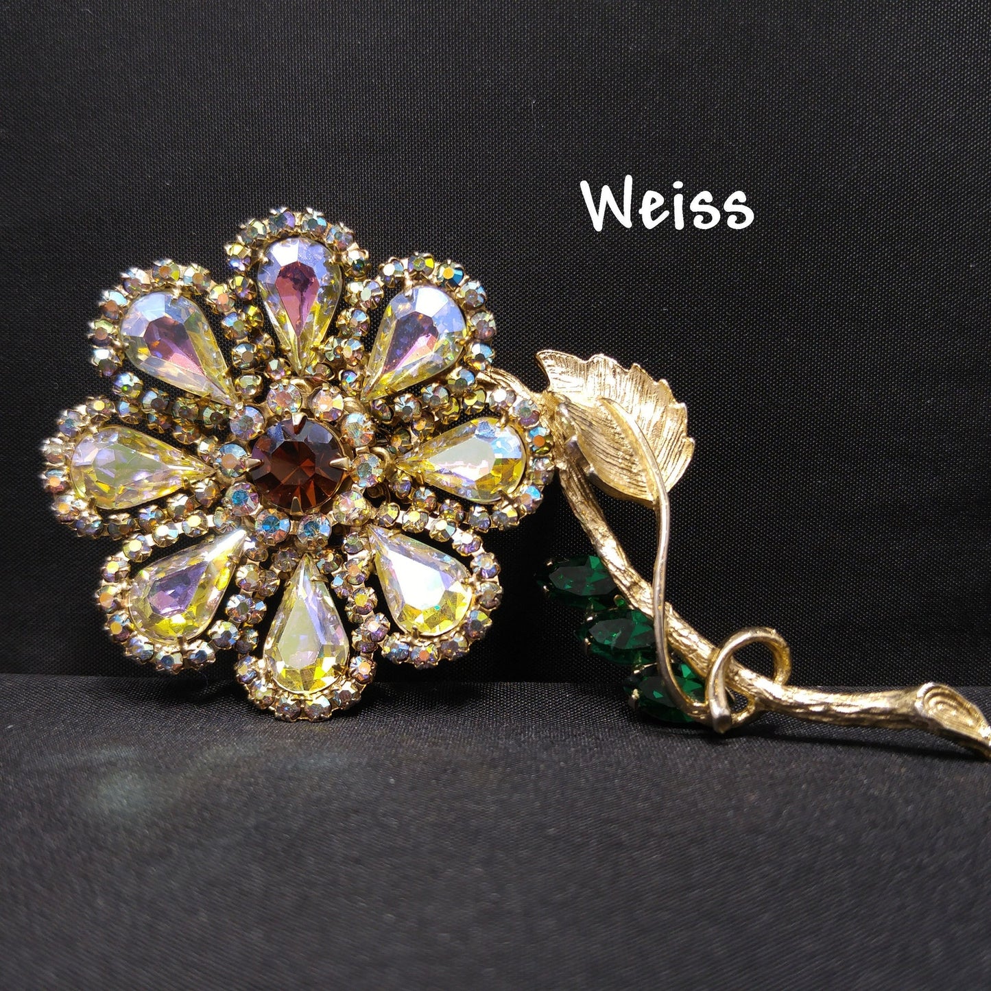 Weiss 1960s Aurora Borealis Rhinestone Flower Brooch with Green Leaves – Gold Plated