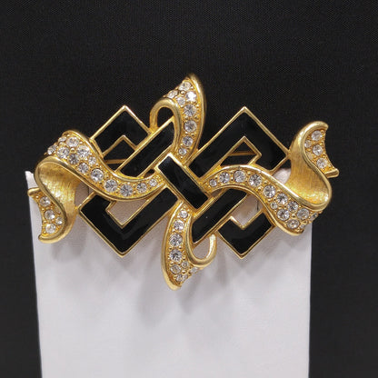 Vintage Swarovski Ribbon Brooch – Black Enamel & Clear Pavé Crystals, 1980s–1990s