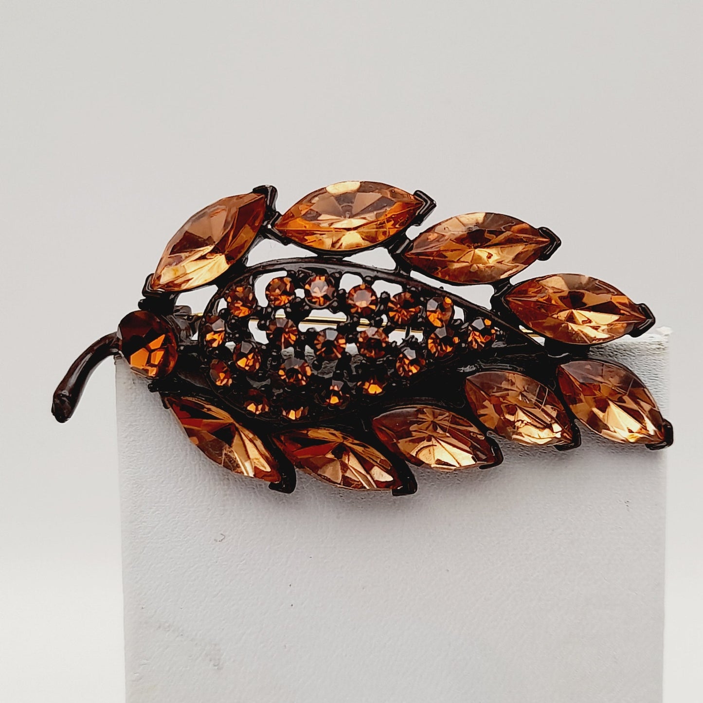 Vintage MGENT Topaz Rhinestone Leaf Japanned Brooch Pin