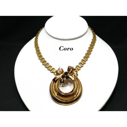 Coro 1948 Adolph Katz Bow Pendant Necklace, Gold Plate, Purple Rhinestones