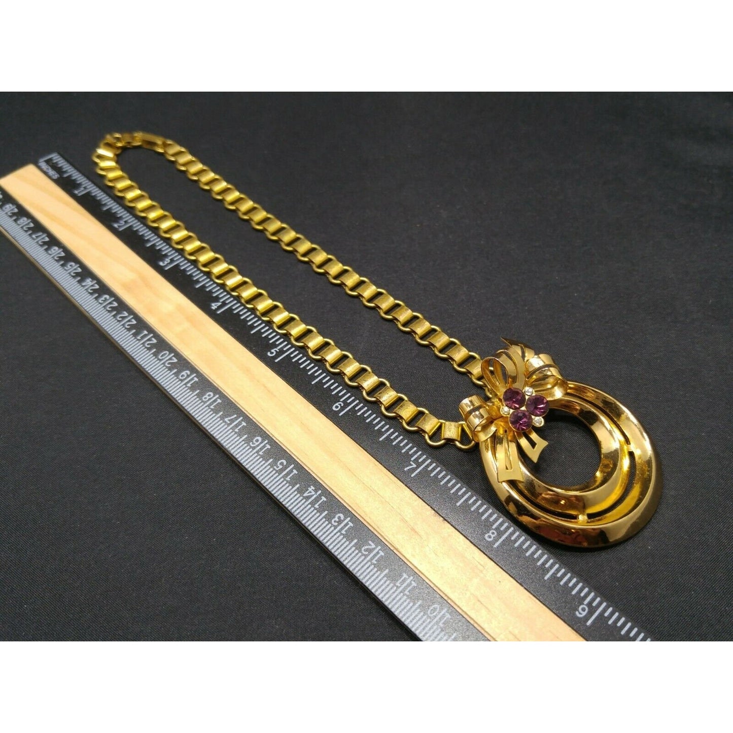 Coro 1948 Adolph Katz Bow Pendant Necklace, Gold Plate, Purple Rhinestones
