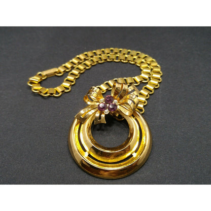 Coro 1948 Adolph Katz Bow Pendant Necklace, Gold Plate, Purple Rhinestones