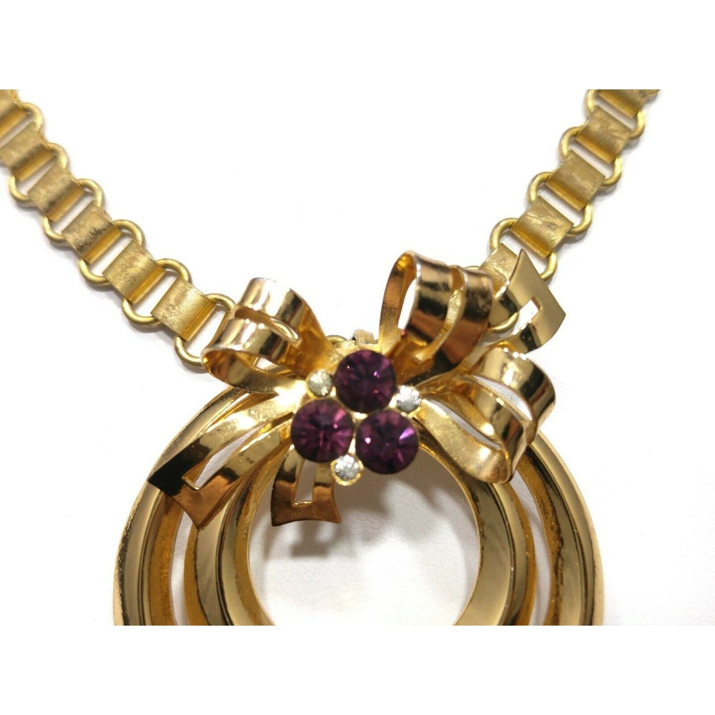 Coro 1948 Adolph Katz Bow Pendant Necklace, Gold Plate, Purple Rhinestones