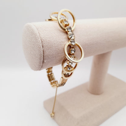 Vintage Sarah Coventry Looped Clear Rhinestone Bracelet – Gold Tone Designer Jewelry