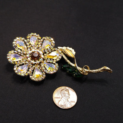 Weiss 1960s Aurora Borealis Rhinestone Flower Brooch with Green Leaves – Gold Plated