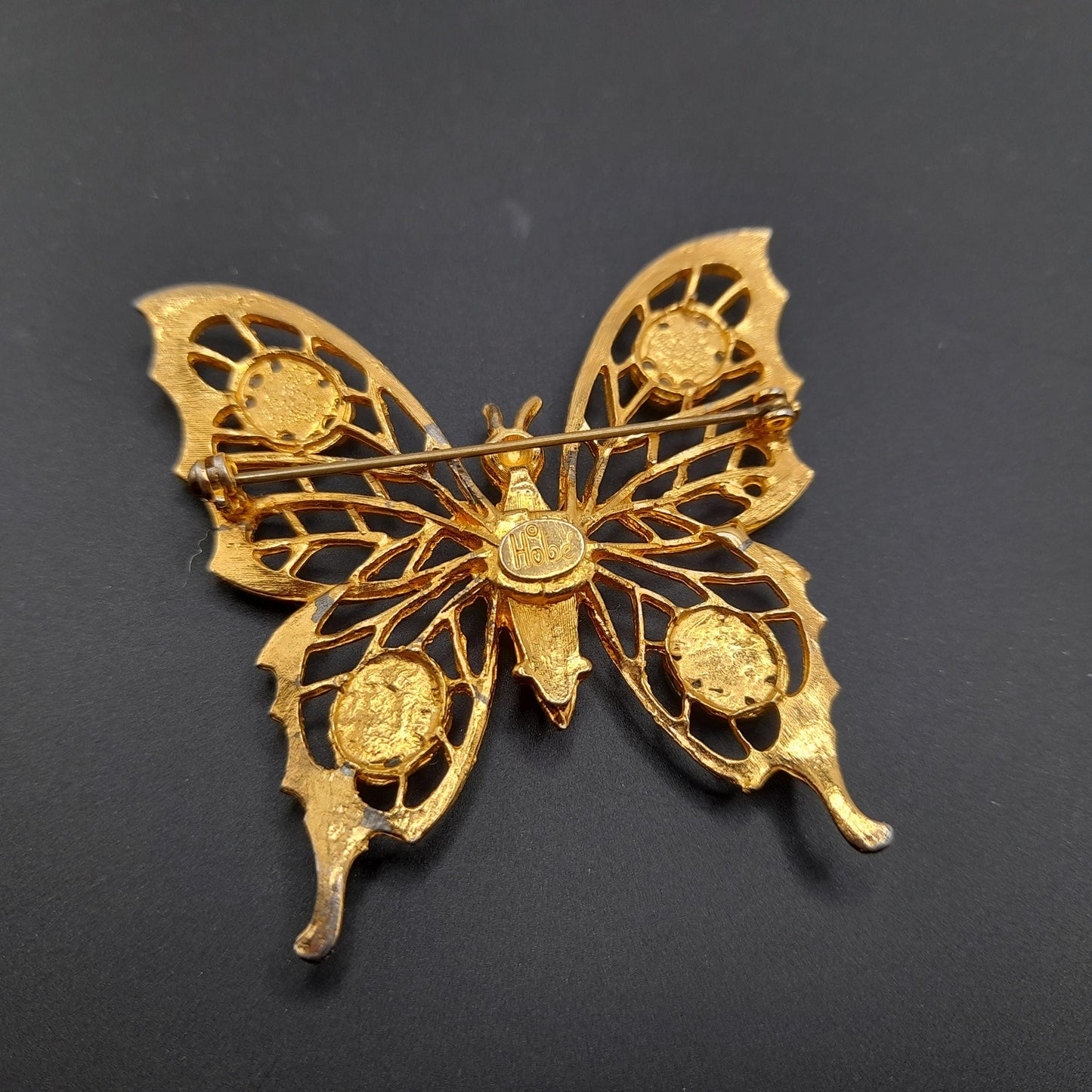 Vintage Hobe’ Gold Butterfly Brooch with Green Gemstones – 1960s Jewelry