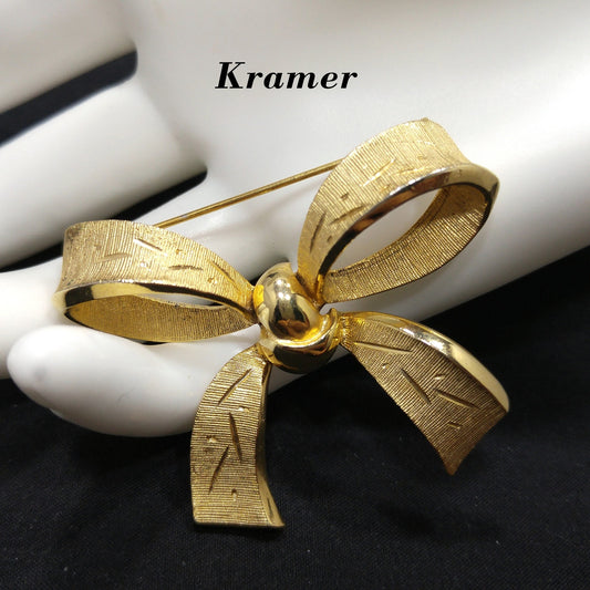 Kramer Gold Plated Bow Brooch, Textured Articulated Sash, 1950s Vintage Jewelry