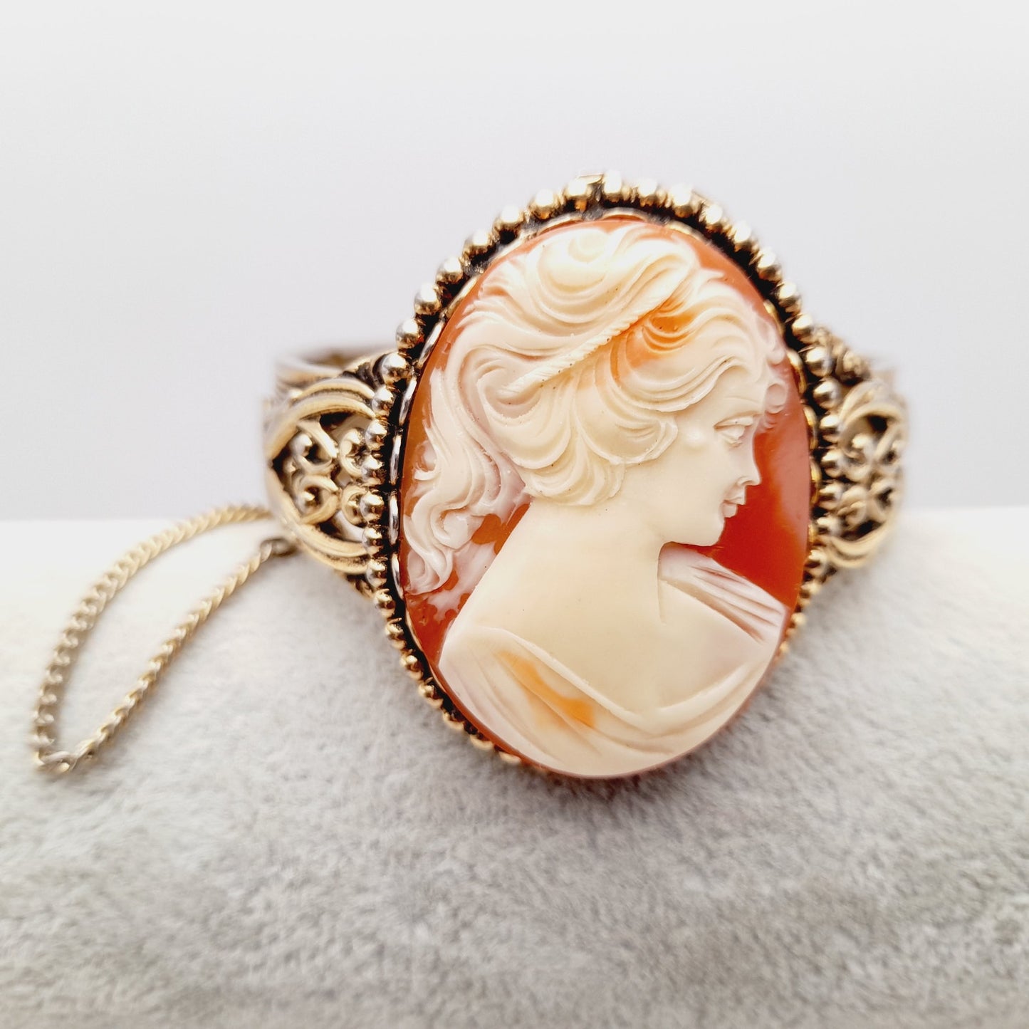 Vintage Lucite Cameo Gold Tone Hinged Bracelet with Safety Chain