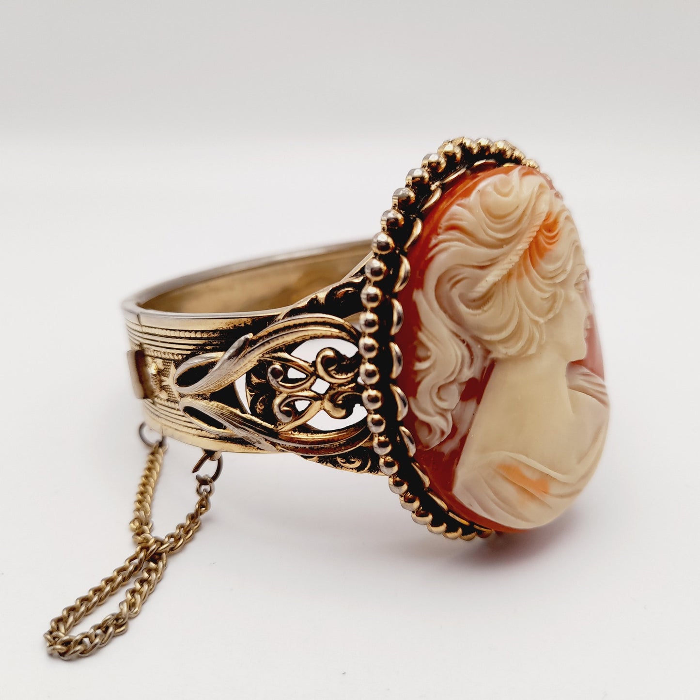 Vintage Lucite Cameo Gold Tone Hinged Bracelet with Safety Chain