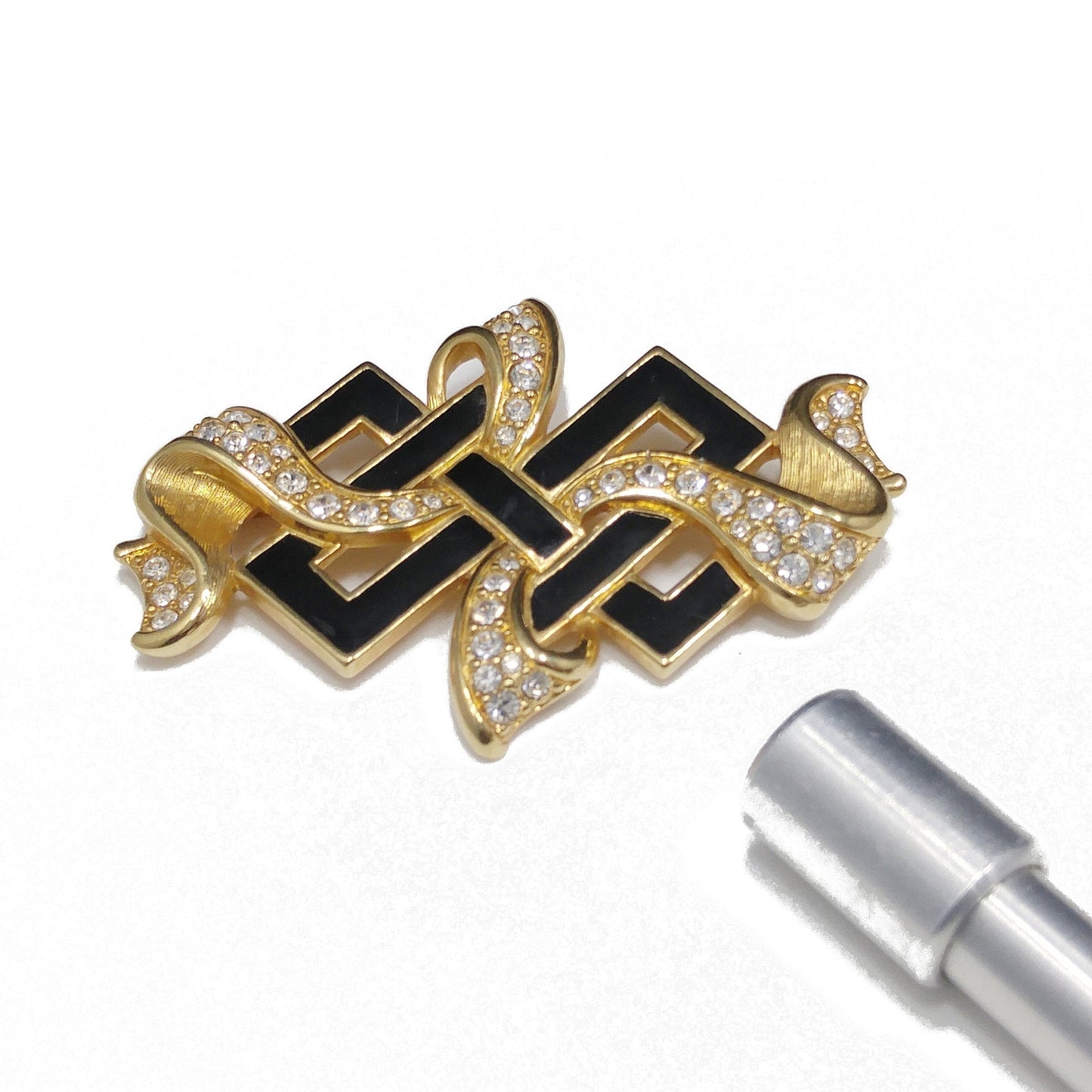 Vintage Swarovski Ribbon Brooch – Black Enamel & Clear Pavé Crystals, 1980s–1990s
