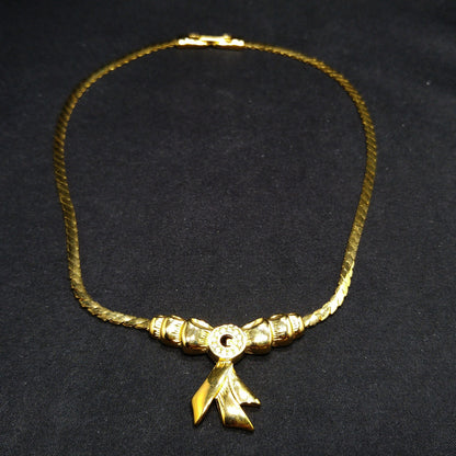 Givenchy Bow Pendant Necklace, Gold Plated, 1980s Vintage Jewelry