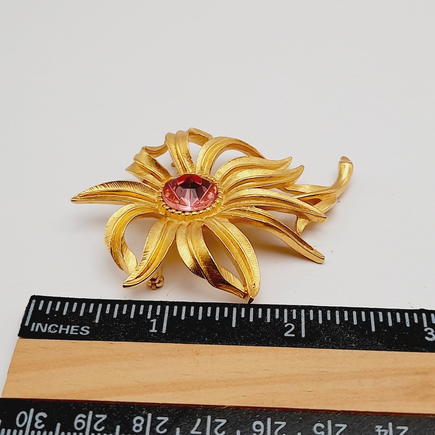 Vintage Trifari™ Flower Brooch with Pink Rhinestone Center
