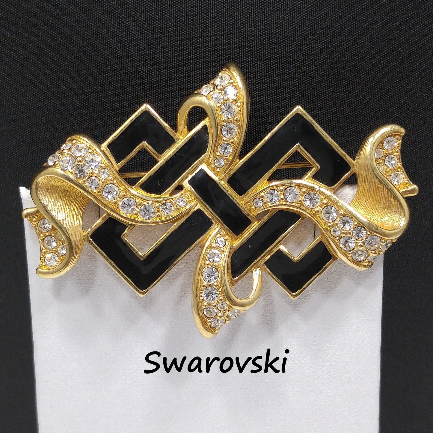 Vintage Swarovski Ribbon Brooch – Black Enamel & Clear Pavé Crystals, 1980s–1990s
