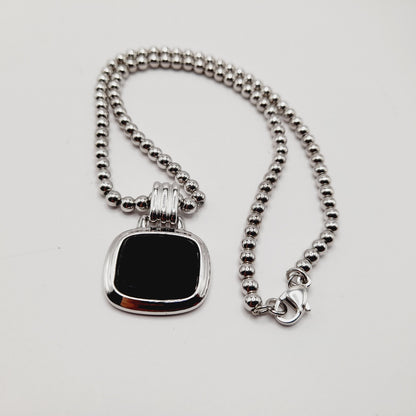 Monet Silver Tone Black Glass Pegasus Pendant Necklace – 16 Inches