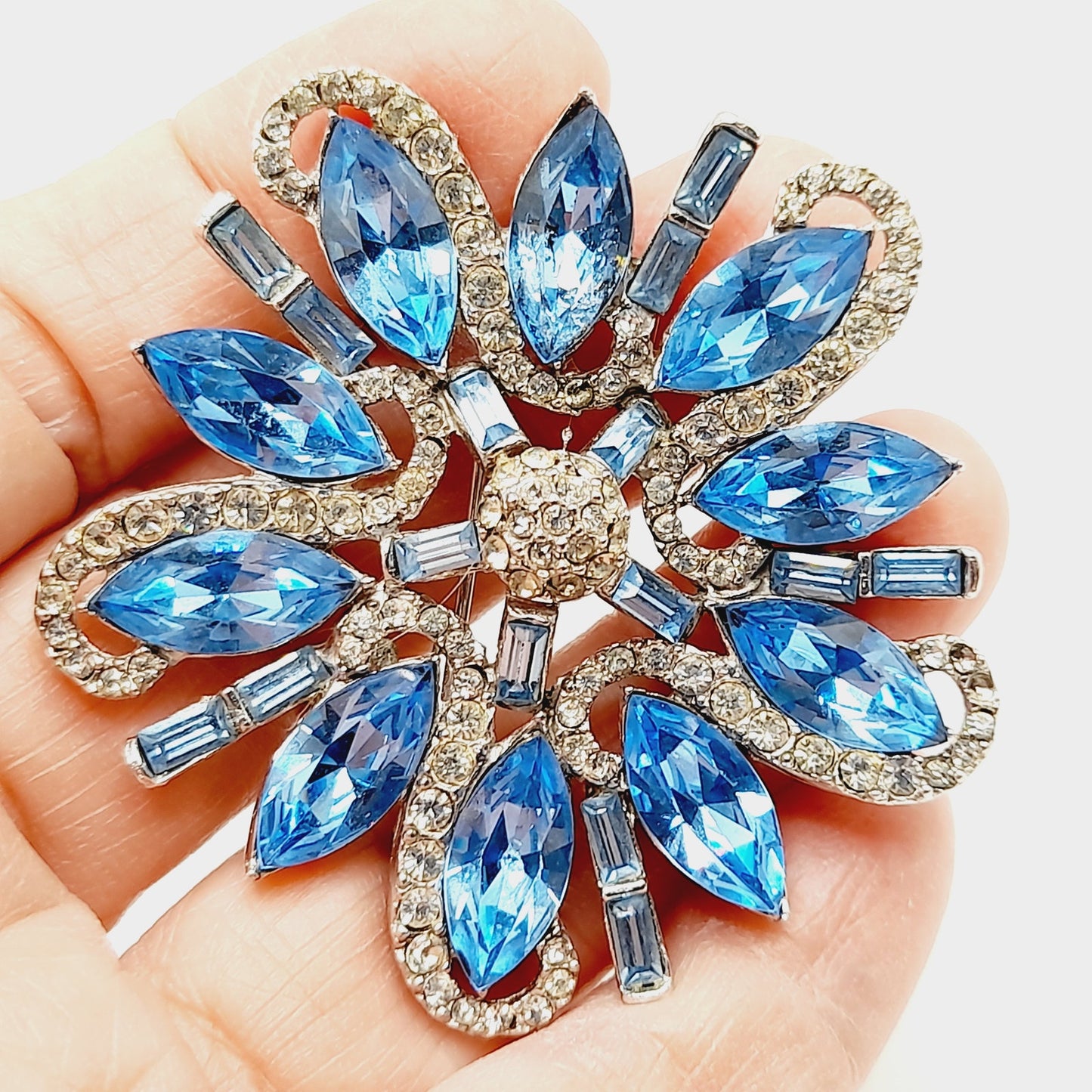 Vintage Rhodium Plated Blue Clear Rhinestone Floral Brooch – 2 1/4 Inches