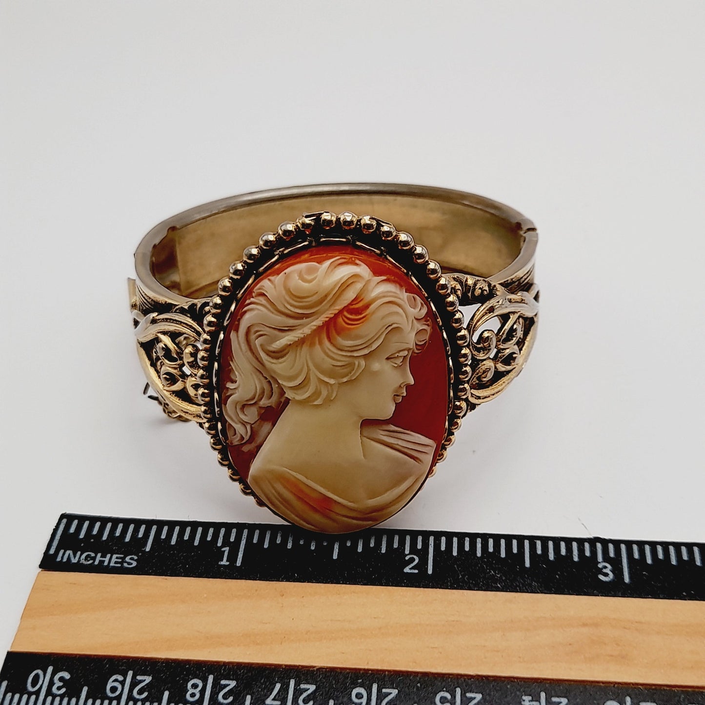 Vintage Lucite Cameo Gold Tone Hinged Bracelet with Safety Chain