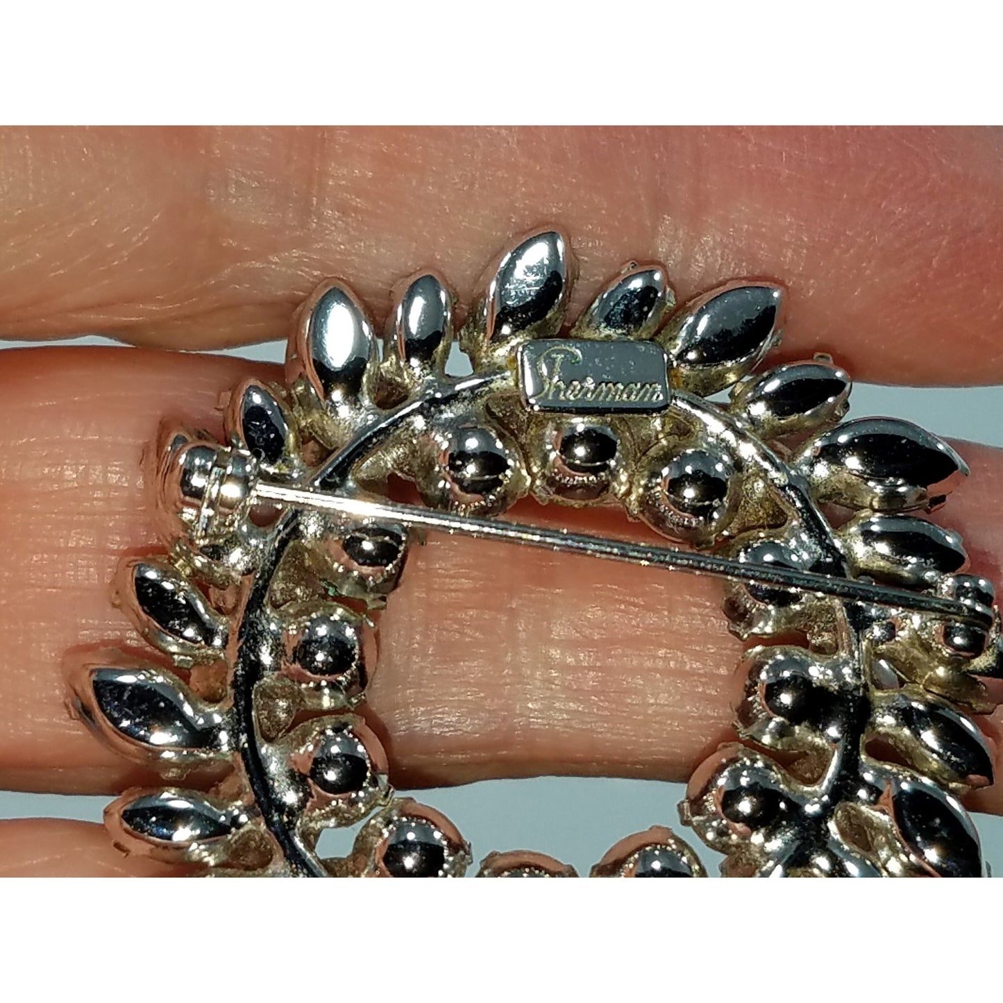 Sherman 1950s Pink & Smoky Gray Rhinestone Wreath Brooch | Rhodium Plated Mid-Century Signed Pin