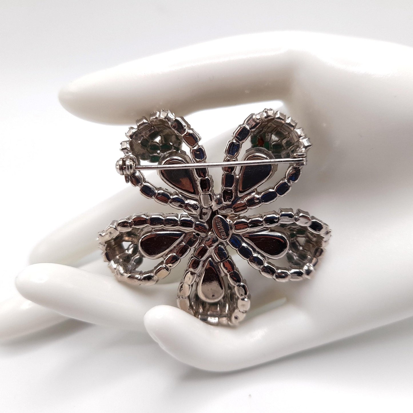 Kramer Floral Brooch, Emerald Green Rhinestones, Rhodium Plated 1960s Vintage Jewelry